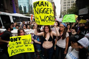 Peak white feminism at a Slut Walk NYC march in 2011. Using racism to combat sexism = FAIL. 