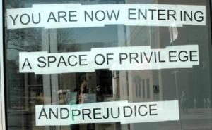 Most places can be considered spaces of privilege and prejudice unless they actively work against oppression. 
