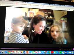 Lindsay DiCuirci, Advisory Board Member, in the middle of virtual teaching with her children